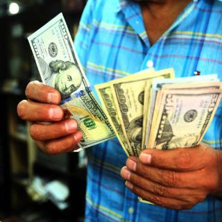 México ofrece bancarización a migrantes