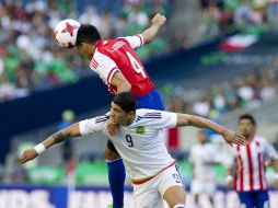 Alan Pulido quedó lesionado después de un encuentro con el paraguayo Luis Cardozo en partido de preparación para la Copa Oro. MEXSPORT / V. Posadas
