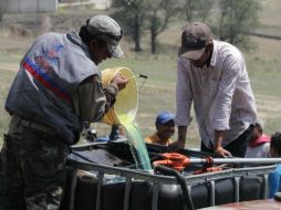 Se ubicaron 10 tambos con capacidad de 200 litros cada uno, con combustible, un bidón de 100 litros, cuatro de 50 litros y dos de 20. EFE / ARCHIVO