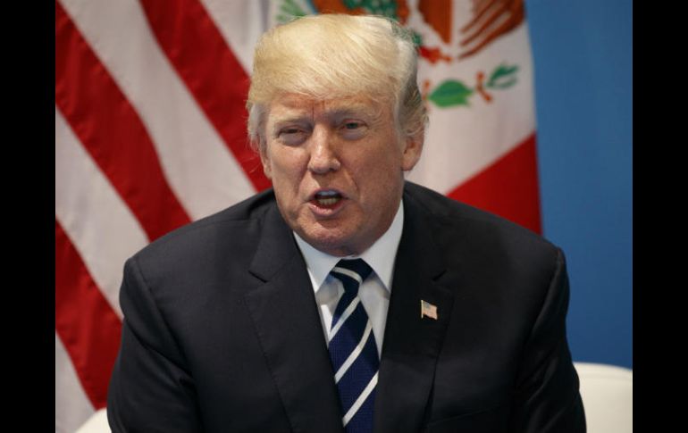 Donald Trump se reúne con Enrique Peña Nieto en Alemania, durante la Cumbre del G-20. AP / E. Vucci