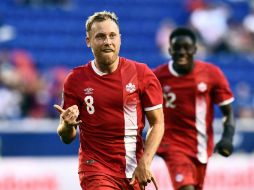 Scott Arfield, de Canadá, celebra uno de sus dos goles de la tarde. AFP / J. Samad