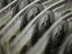 El tipo de cambio para solventar obligaciones denominadas en moneda extranjera pagaderas en el país se ubica en 17. 9751 pesos. EL INFORMADOR / ARCHIVO