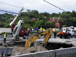 La Ayudantía Municipal del poblado de Chipitlán también pidió ayuda para reparar el paso y evitar una tragedia. EFE / T. Rivera