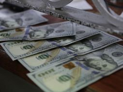 El índice dólar se deprecia 0.3 por ciento contra la canasta de divisas esta mañana. EL INFORMADOR / ARCHIVO