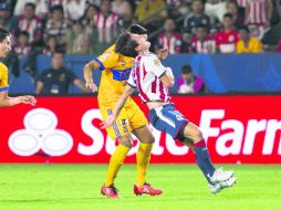 Calvario. El Guadalajara pasó momentos complicados durante gran parte de su encuentro frente a Tigres. MEXSPORT /