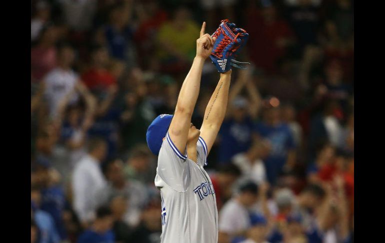 El sinaloense retiró el noveno episodio sin aceptar carrera ni hits, con un ponche, para preservar el triunfo de Azulejos. AFP / A. Glanzman