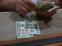 El tipo de cambio para solventar obligaciones denominadas en moneda extranjera pagaderas en el país se ubica en 17.5134 pesos. EL INFORMADOR / ARCHIVO