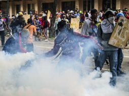 Manifestantes que impedían la circulación se enfrentaron con las fuerzas del orden. AFP / R. Schmidt