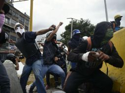 Durante la jornada, al menos nueve personas resultaron heridas en disturbios callejeros. AFP / J. Barreto