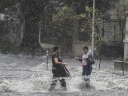 Es importante mantenerse al tanto de las alertas emitidas por el SMN y evitar transitar por áreas inundadas. EL INFORMADOR / F. Atilano