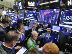 La jornada estuvo marcada por la reacción del parqué neoyorquino a los últimos resultados difundidos por empresas claves del mercado. AP / R. Drew