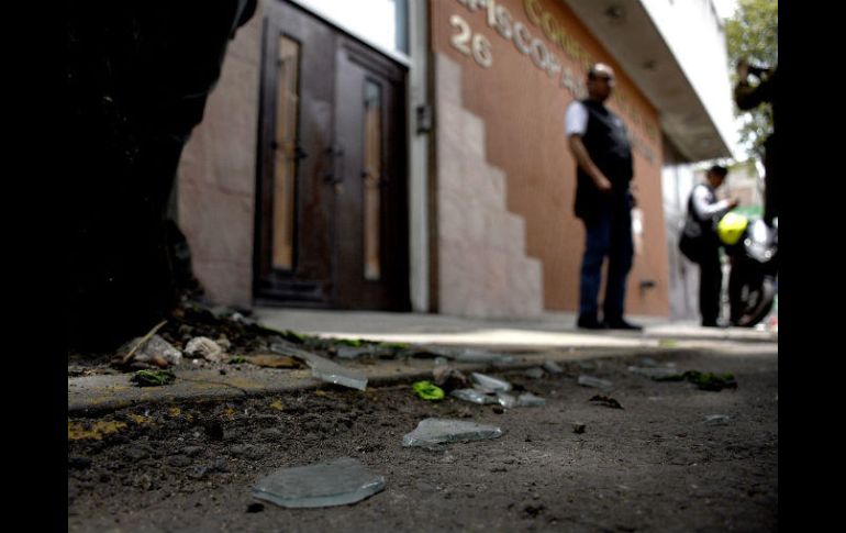 Peritos en materia de criminalística, fotografía, incendios y explosivos recolectan y procesan evidencias. SUN / A. Romero
