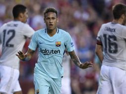 El gol llegó con la clásica arrancada de Messi en el centro del campo y cedió al hueco para Neymar quien anotó. AFP / B. Smialowski