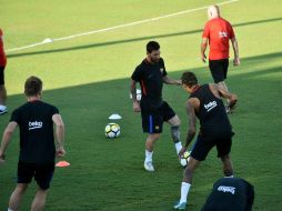 Lionel Messi y Neymar entrenan en la Universidad Barry de Miami, Florida. AFP / H. Retamal
