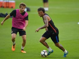 El club catalán vive expectante las últimas horas, esperando la decisión del brasileño. AFP / H. Retamal