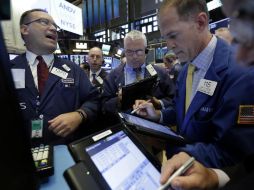 La jornada estuvo marcada por un clima de optimismo estimulado por el resultado de las empresas. AP / R. Drew