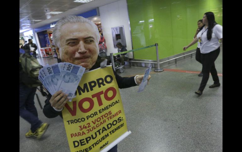 Si dos tercios de los 513 diputados votan a favor, Temer sería suspendido del cargo y enjuiciado ante el Tribunal Supremo. AP / E. Peres