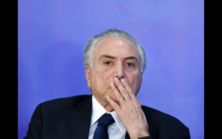 La oposición acusa a Temer de haber liberado en las últimas semanas cuantiosos fondos para proyectos de diputados vacilantes. AFP /