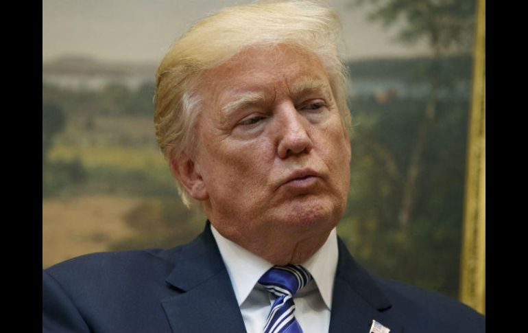 The Washington Post dio a conocer una conversión en la cual Trump presionó a Peña para deje de decir que no pagará por el muro. AP / E. Vucci