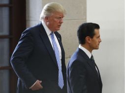 Según la fuente, Trump sugirió que la frase 'no pagaremos' se cambiara a 'Lo solucionaremos'. AP / ARCHIVO