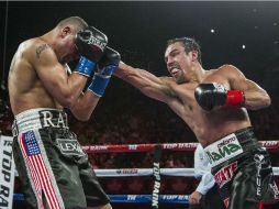 Márquez se retira del pugilismo con récord de 56-7-1. AP / ARCHIVO