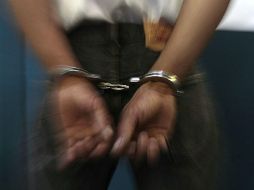 Al momento de ser detenido, se le aseguró una pistola y sobres con billetes falsos que sumaban la cantidad de 20 mil pesos. EL INFORMADOR / ARCHIVO