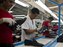 En México, los trabajadores ganan la cuarta parte de los salarios de sus pares de EU. AFP / ARCHIVO