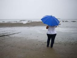 El Meteorológico recomendó a la población extremar precauciones por lluvias, viento y oleaje. AFP / V. Razo