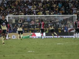 En tiempo de compensación Oribe Peralta (#24) no se anduvo con miramientos y cobró el penalti fuerte, raso y colocado. EL INFORMADOR / F. Atilano