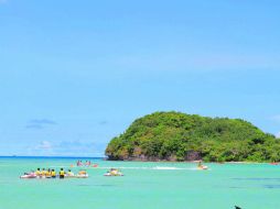 El turismo proporciona a la isla un tercio de sus empleos. AFP /