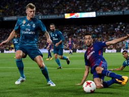 'Tenemos que hacerlo sí o sí', dice Busquets (D) sobre la renovación del plantel. AFP / J. Lago