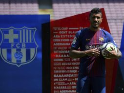 El futbolista firmó su contrato que lo vincula al Barça hasta el 30 de junio de 2021 y que incluye cláusula de rescisión de 120 MDE. AFP / L. Gene