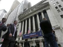El NYSE Composite también presenta un retroceso de 30.07 puntos (-0.25 por ciento) al operar en 11 mil 838.78 unidades. AP / ARCHIVO
