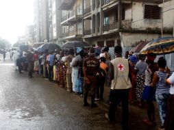 Debido a las lluvias, la ladera de una montaña colapsó el lunes en la localidad de Regent, a las afueras de la capital Freetown. AFP / S. Bah