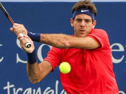 Juan Martín del Potro regresa una bola al búlgaro Grigor Dimitrov. EFE / T. Maury