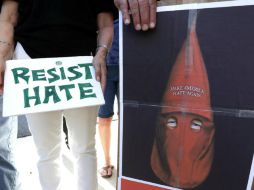 Para Romney, Trump debería ''dejar en claro de manera firme e inequívoca que los racistas son cien por ciento culpables''. EFE / M. Nelson