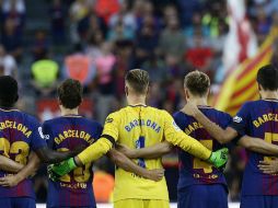 Antes del partido, los jugadores guardaron un minuto de silencio por las víctimas del atentado en Las Ramblas. AP / M. Fernandez
