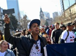 Manifestaciones de este domingo a favor de los migrantes, en el centro de Santiago de Chile AP / E. Felix