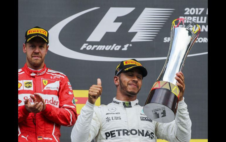 El podio de este domingo es completado con el australiano Daniel Ricciardo de EFE / S. Suki