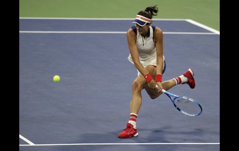 Muguruza logró imponerse al intenso juego de su rival con una demostración del progreso en su juego. AP / J. Cortez