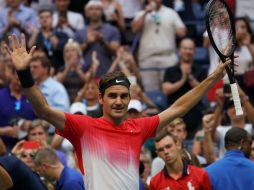 Federer peleó por tres horas y ocho minutos para doblegar a Youzhny con parciales de 6-1, 6-7 (37), 4-6, 6-4 y 6-2. AFP / D. Emmert