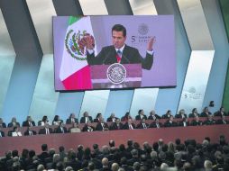 Enrique Peña Nieto acentuó que en la actual administración se generaron más puestos de trabajo que en cualquier otro sexenio. AFP /