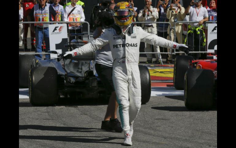 El inglés logra su sexta victoria de la temporada, la quincuagésimo novena desde que pilota en Fórmula Uno. AP / L. Bruno