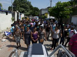 Los cuerpos son enterrados en los dos panteones municipales, Domingo de Ramos y Miércoles Santo. AP / R. Blackwell