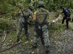 Recomiendan a la población permanecer atenta a la información que proporcione la Armad de México. AFP / Y. Cortéz