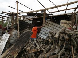 El Mandatario lamentó la muerte de dos personas en un deslave en Veracruz. AP / E. Verdugo