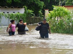 Entre las consecuencias que dejó 'Katia' a su paso, están las viviendas inundadas, los ríos desbordados y los deslizamientos de tierra. SUN / J.M, Aguilera