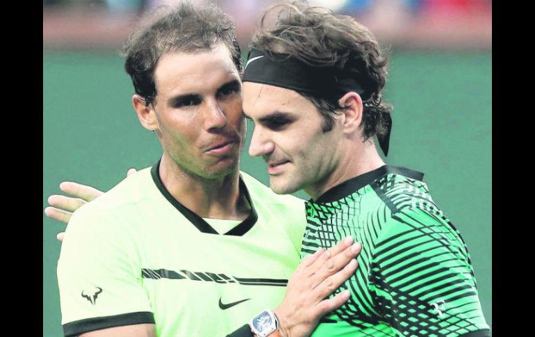 Rafael Nadal y Roger Federer han marcado toda una época dentro del tenis en el nuevo milenio. AFP /