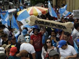 Las manifestaciones, que comenzaron el jueves, obligaron al presidente Jimmy Morales a cancelar el Desfile de la Independencia. AFP / J. Ordonez