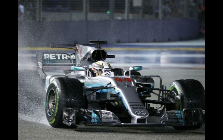 Con este resultado, el británico logra mantenerse en el puesto número uno del campeonato mundial. AP / Y. Teck Lim